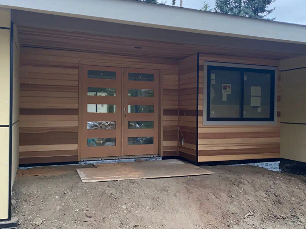 Siding installation and exterior trim work on a Seattle-area home (photo 9 of 28)