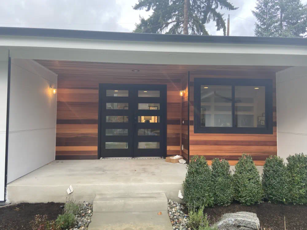 Siding installation and exterior trim work on a Seattle-area home (photo 12 of 28)