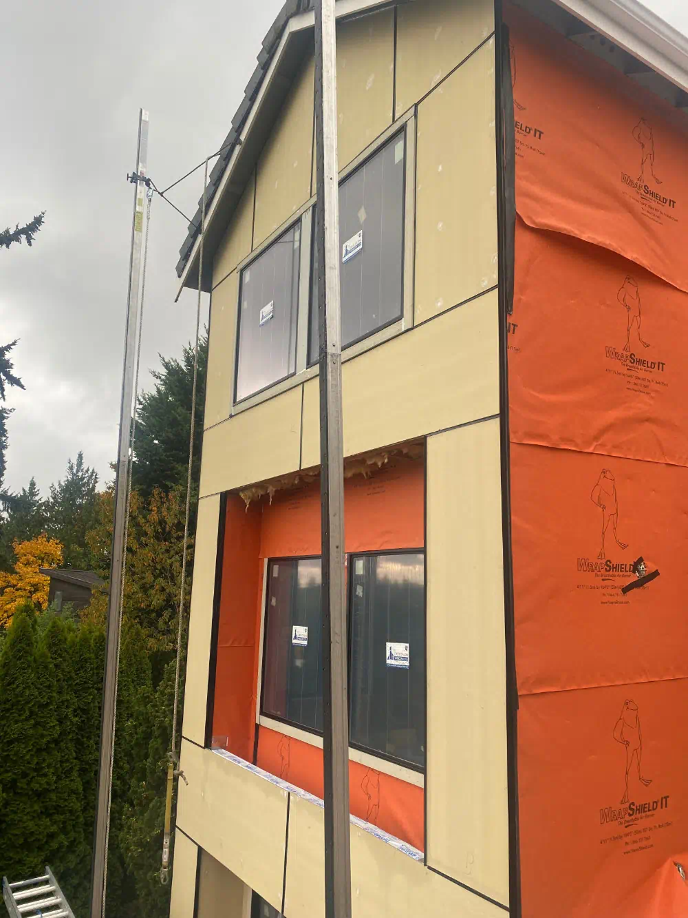 Siding installation and exterior trim work on a Seattle-area home (photo 16 of 28)
