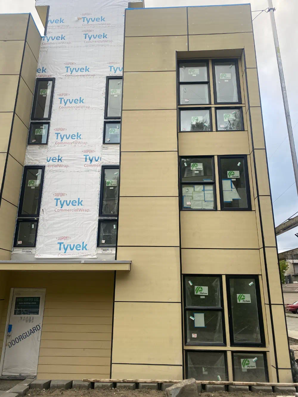 Siding installation and exterior trim work on a Seattle-area home (photo 17 of 28)