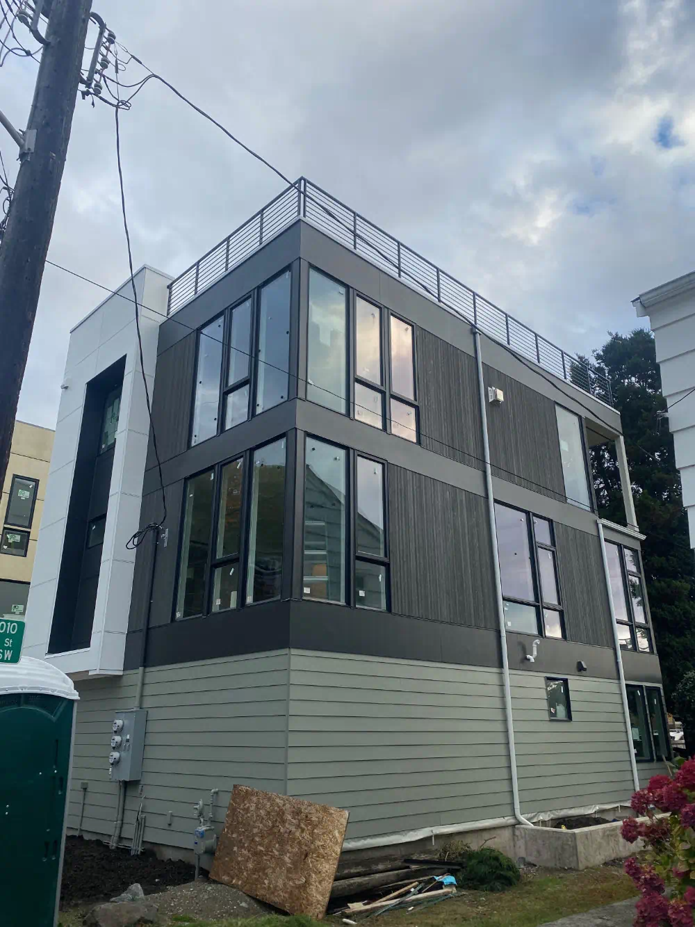 Siding installation and exterior trim work on a Seattle-area home (photo 19 of 28)