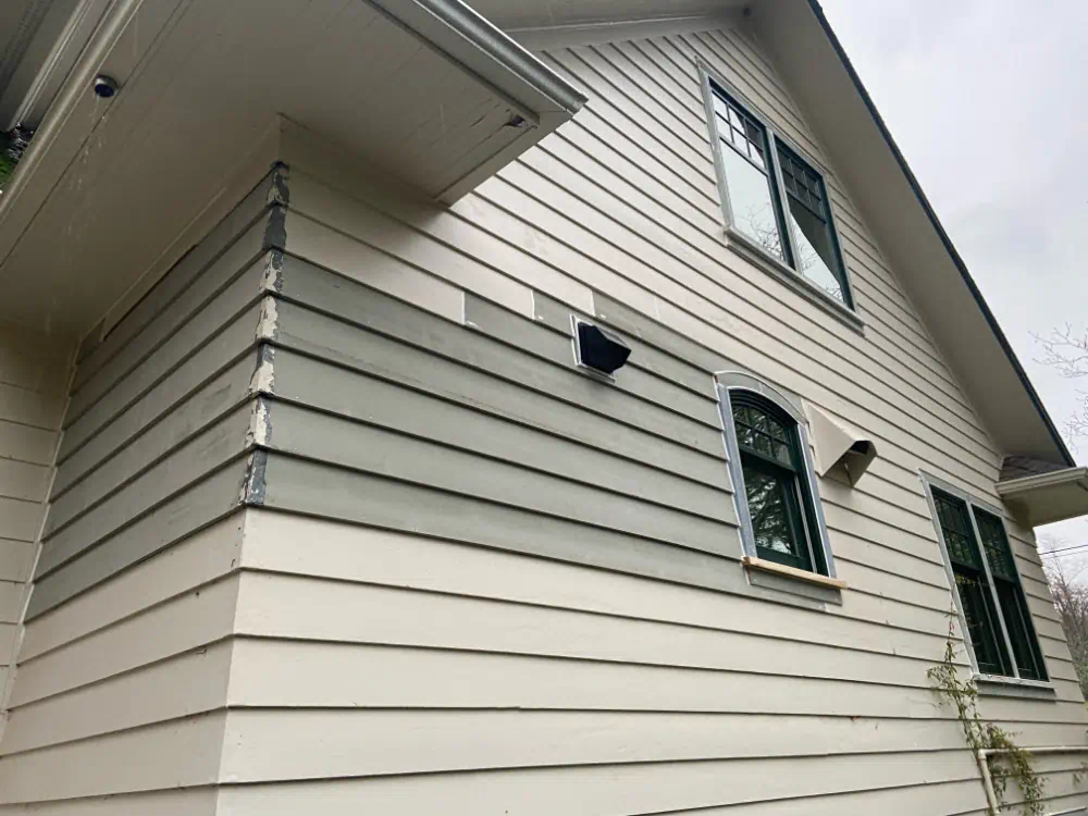 Siding installation and exterior trim work on a Seattle-area home (photo 20 of 28)