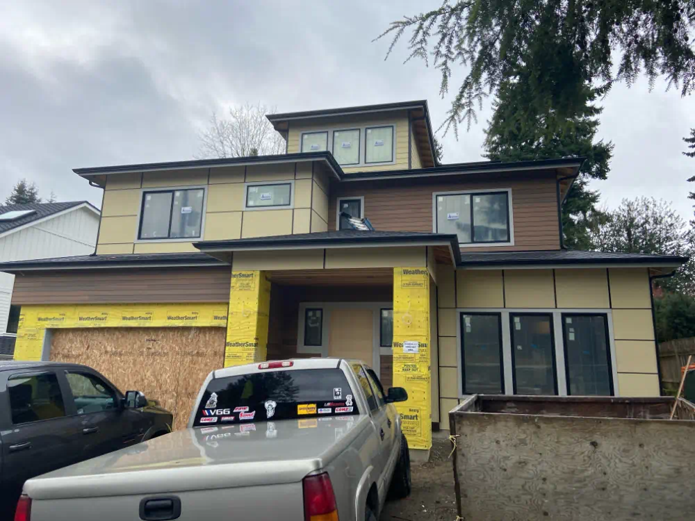 Siding installation and exterior trim work on a Seattle-area home (photo 25 of 28)