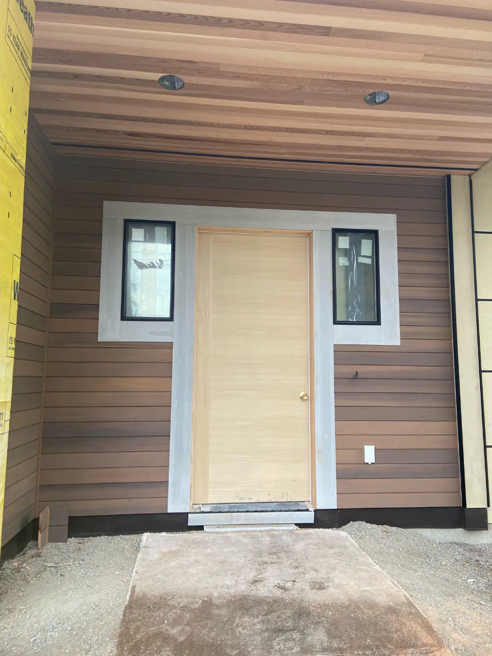 Siding installation and exterior trim work on a Seattle-area home (photo 26 of 28)