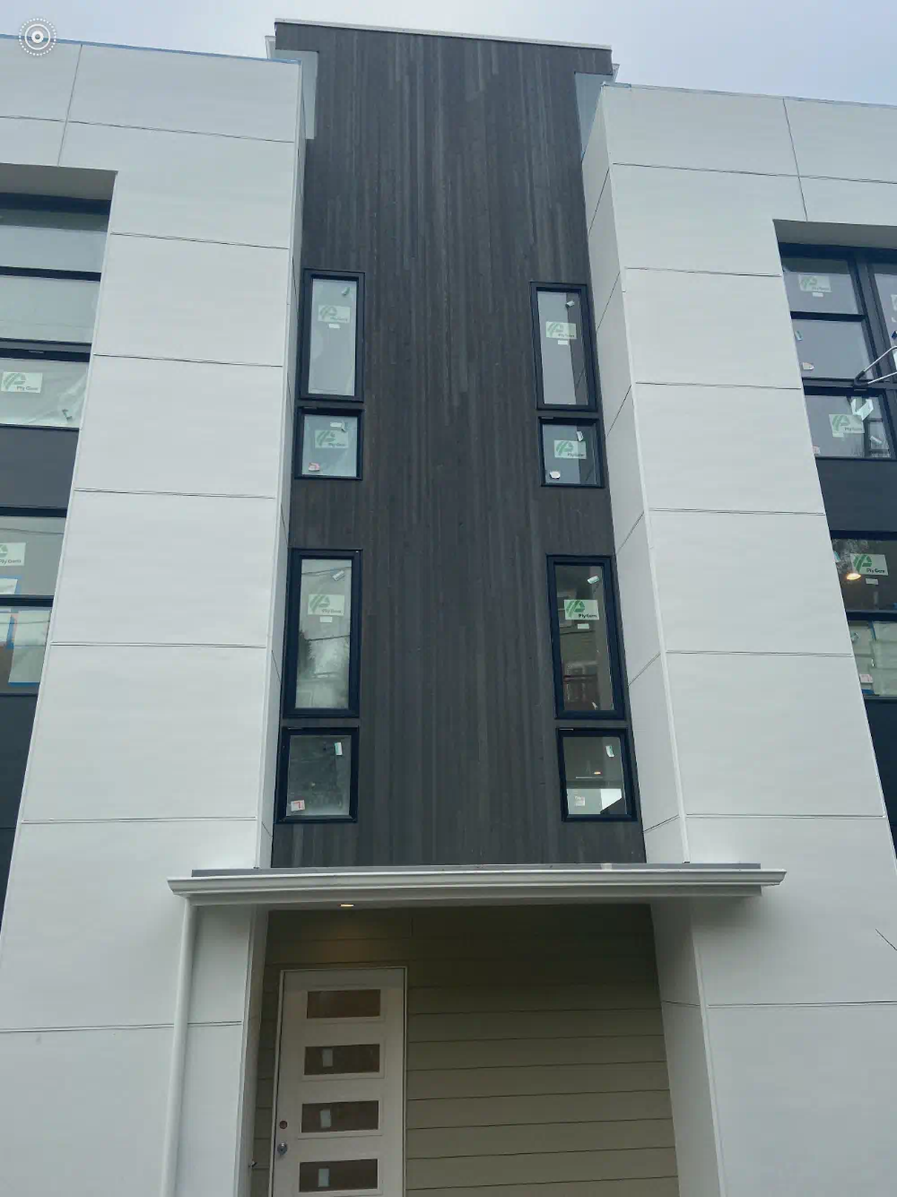 Replaced exterior trim and finished siding on a Seattle-area building (photo 3 of 7)
