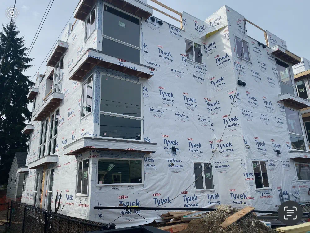 Replaced exterior trim and finished siding on a Seattle-area building (photo 4 of 7)
