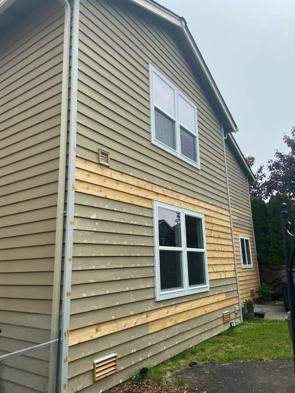 Siding installation and exterior trim work on a Seattle-area home (photo 28 of 28)