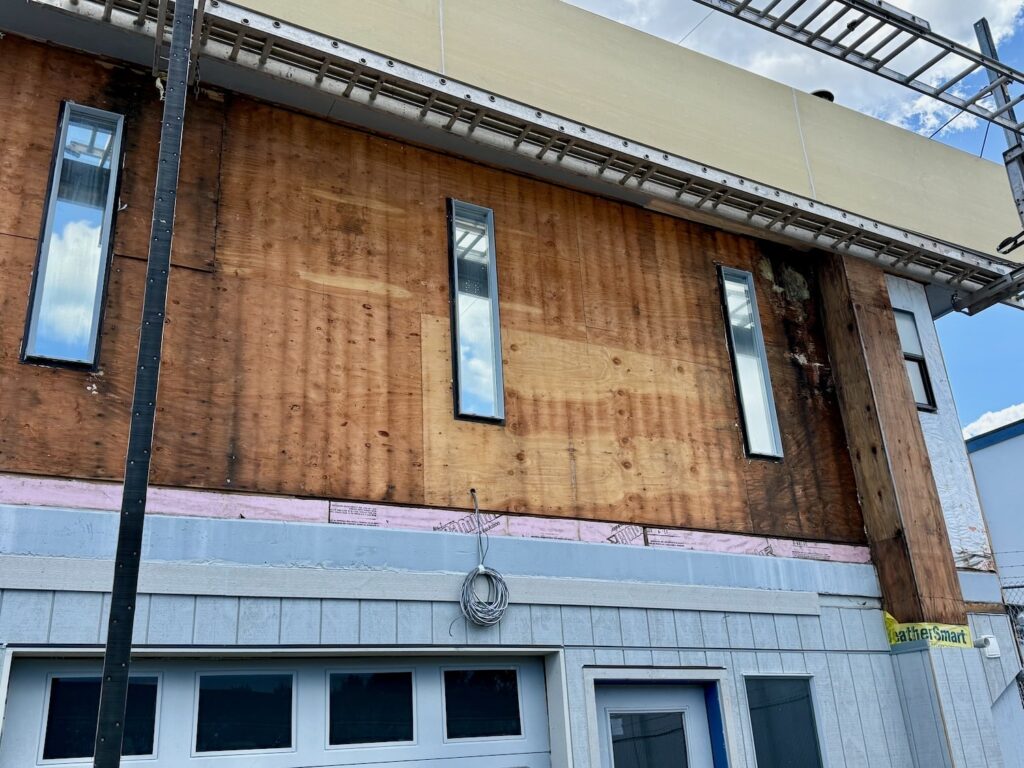 a building with a lot of dry rot and mold
